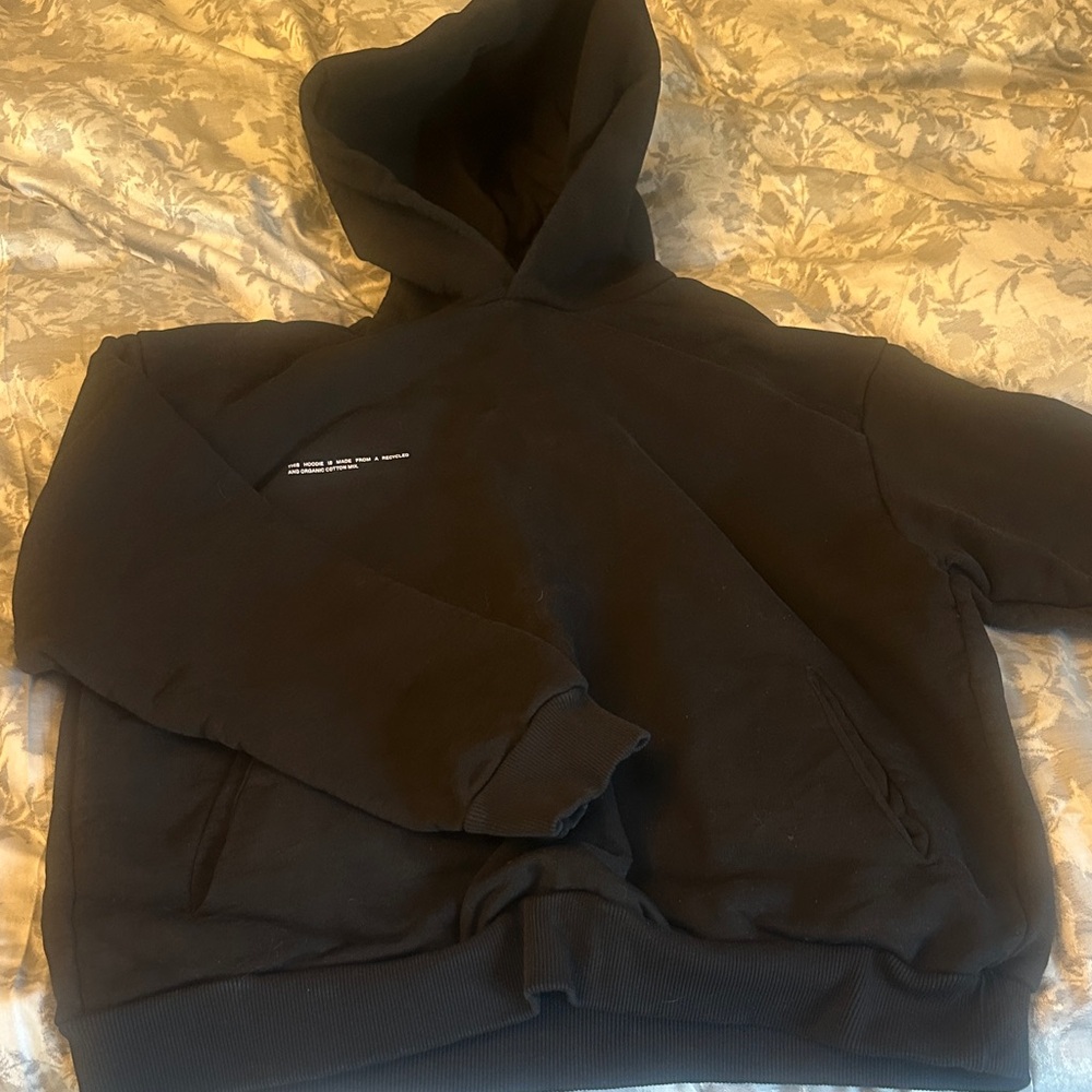 Pangaia Black Hoodie with White Tag